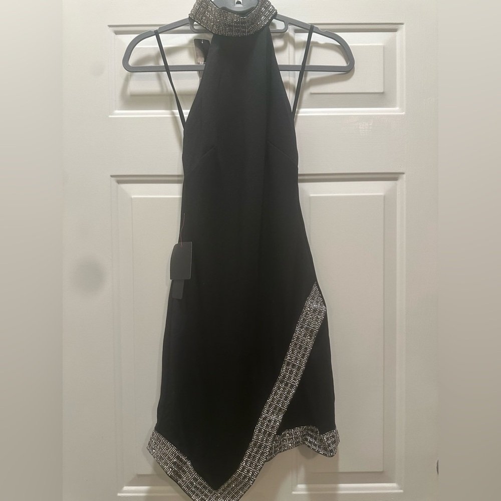 Gorgeous and sexy Bebe black halter dress with rhinestone neck & detailing NWT.
